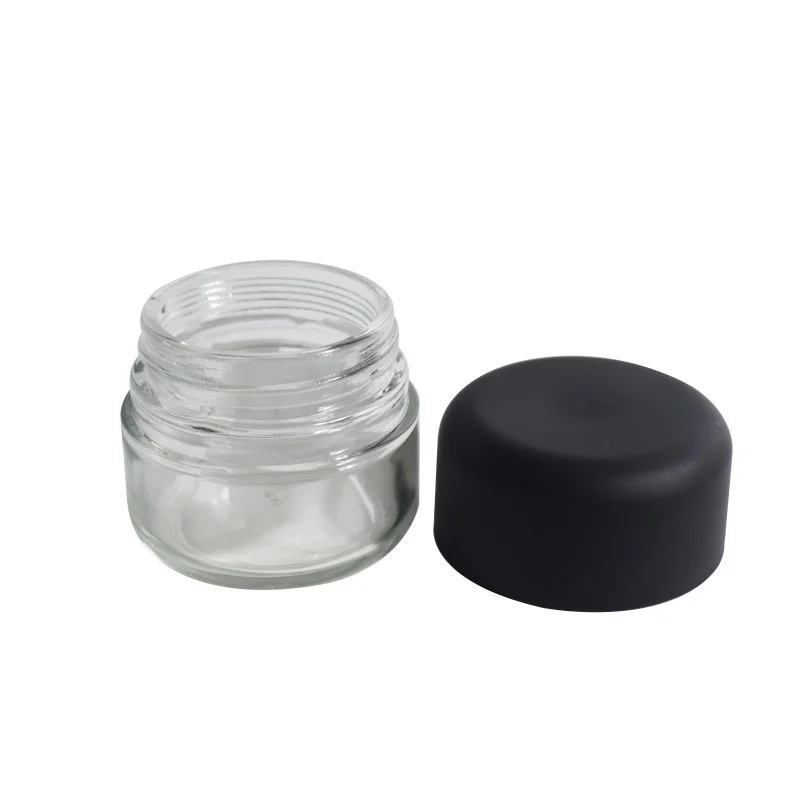Customized and sample available small glass food honey jars with child resistance lid in stock mini glass jar container