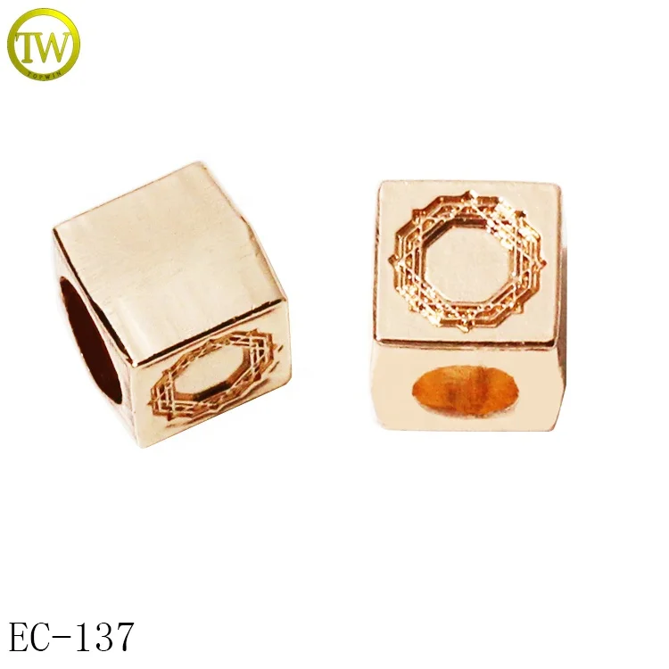 Custom made swimwear metal cord end stoppers large hole bikini hardware metal cord spring toggle stopper for beachwear