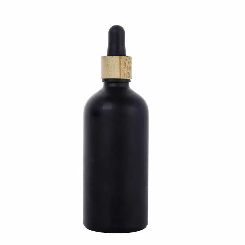 Glass oil dropper and spray mat black frosted amber glass bottle with bamboo spray pump 30 ml dropper cosmetic