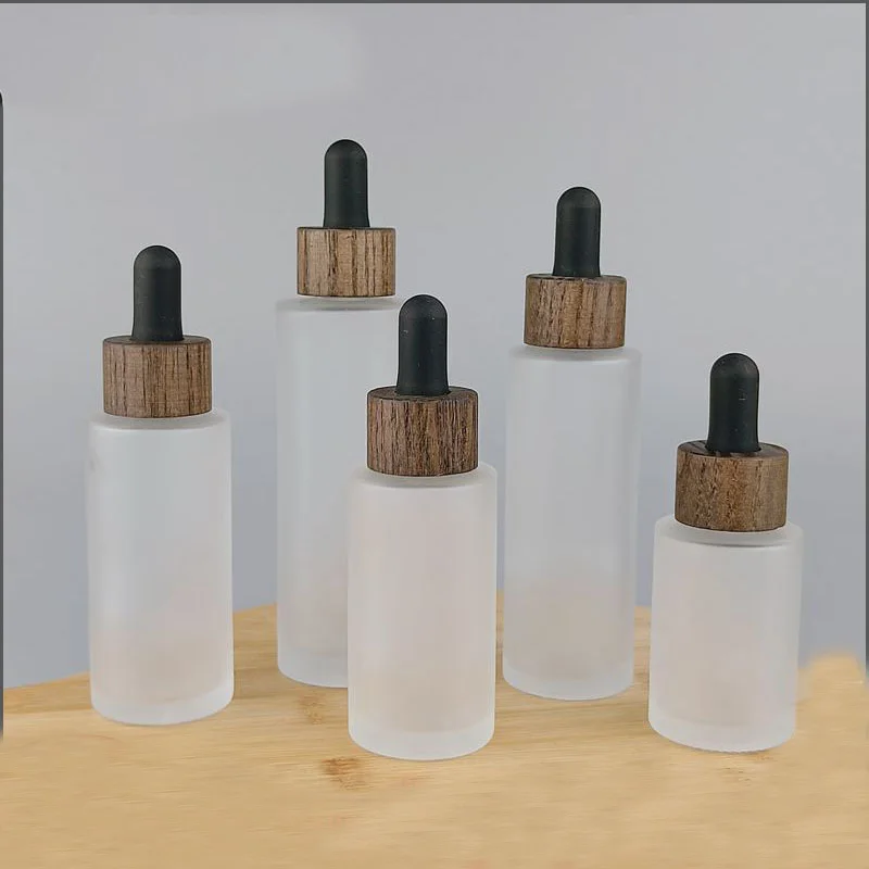 Cosmetic Bottle Empty Essential Oil Bottle 30ml 40ml 50ml 60ml 80ml Frosted Glass Dropper Bottle with Solid Wood Dropper Cover