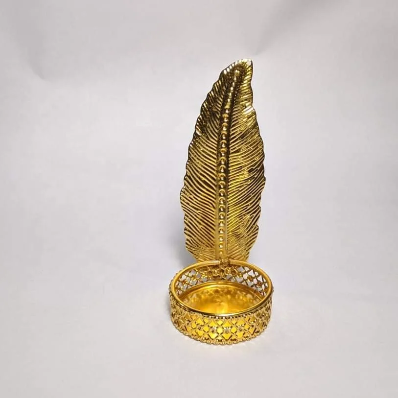 
Diwali Shadow Diya в форме листа 