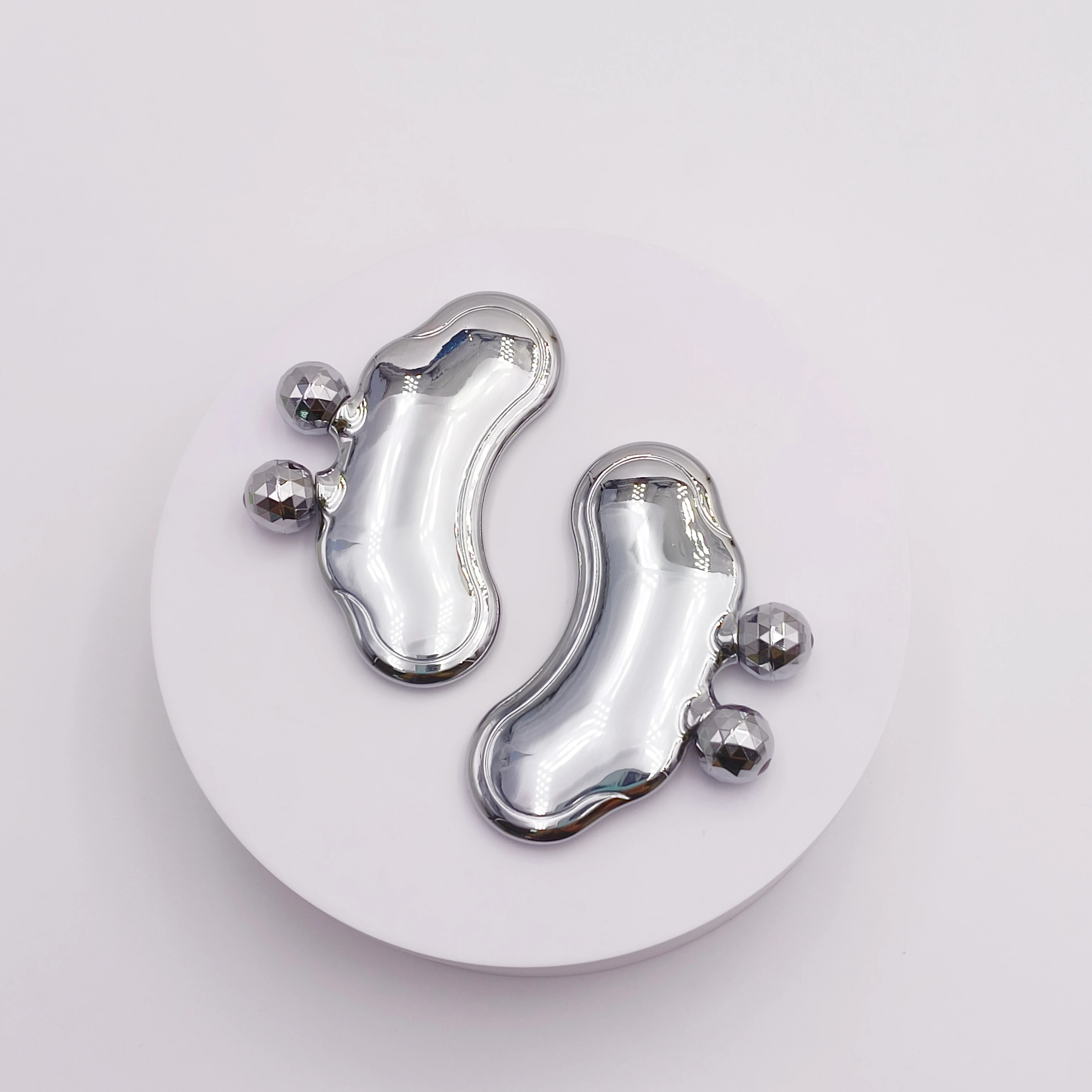 Hot Selling 3D Roller Metal Scraping Tightening Skin Care Customized Gua Sha Scraping Board