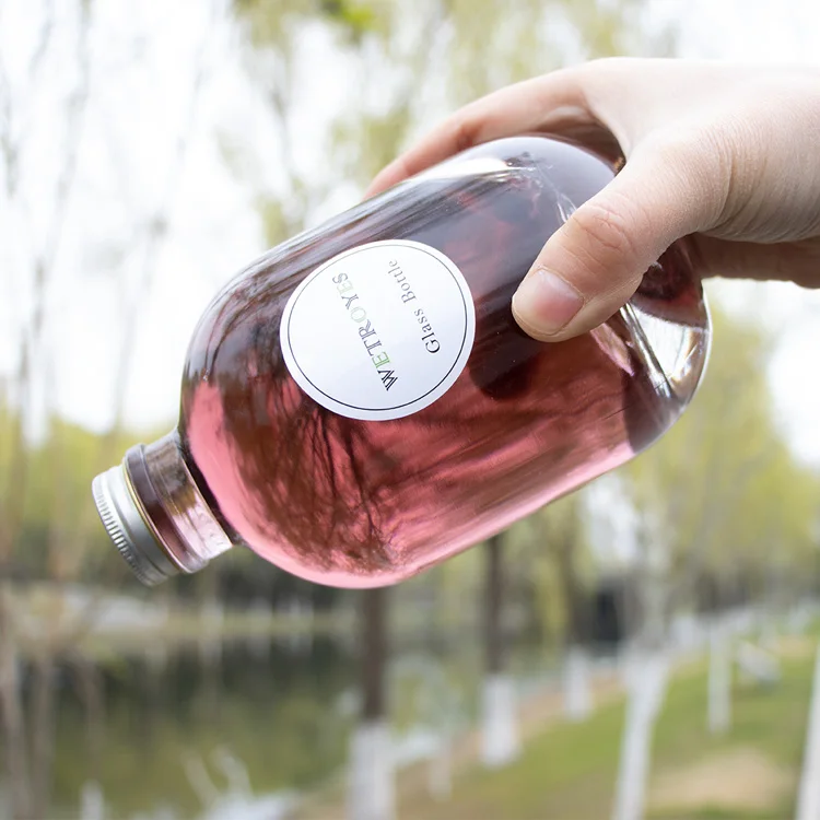 Wholesale Liquor Glass Bottle Supplier Food Grade 750ml Round Glass Bottle for Whiskey Rum Gin