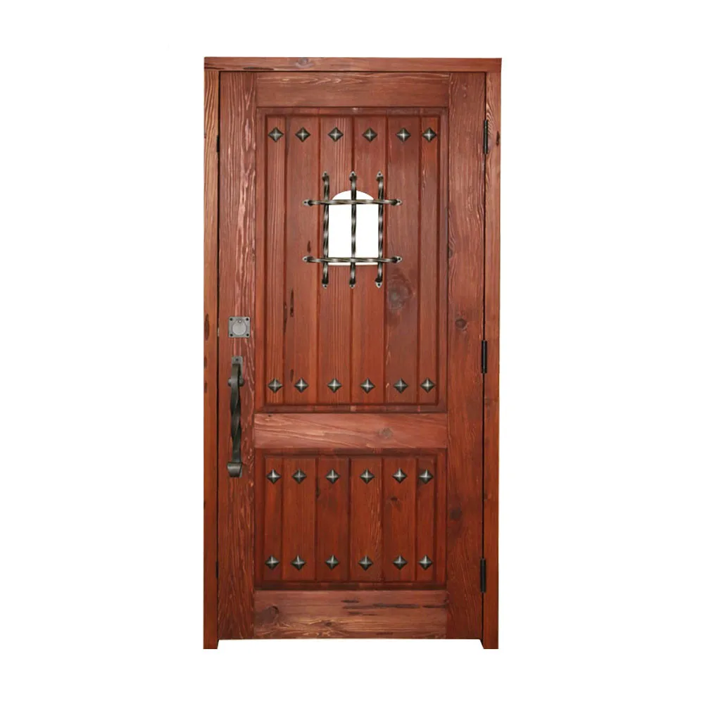 Traditional old castle wood door with wrought iron grill and clavos