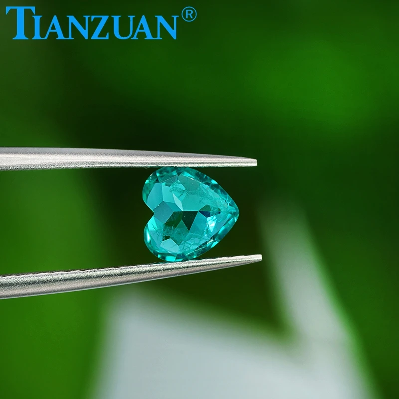 heart shape Paraba color Yttrium Aluminum Garnet Cultivated Tsavorite with inclusions artificial gem stone
