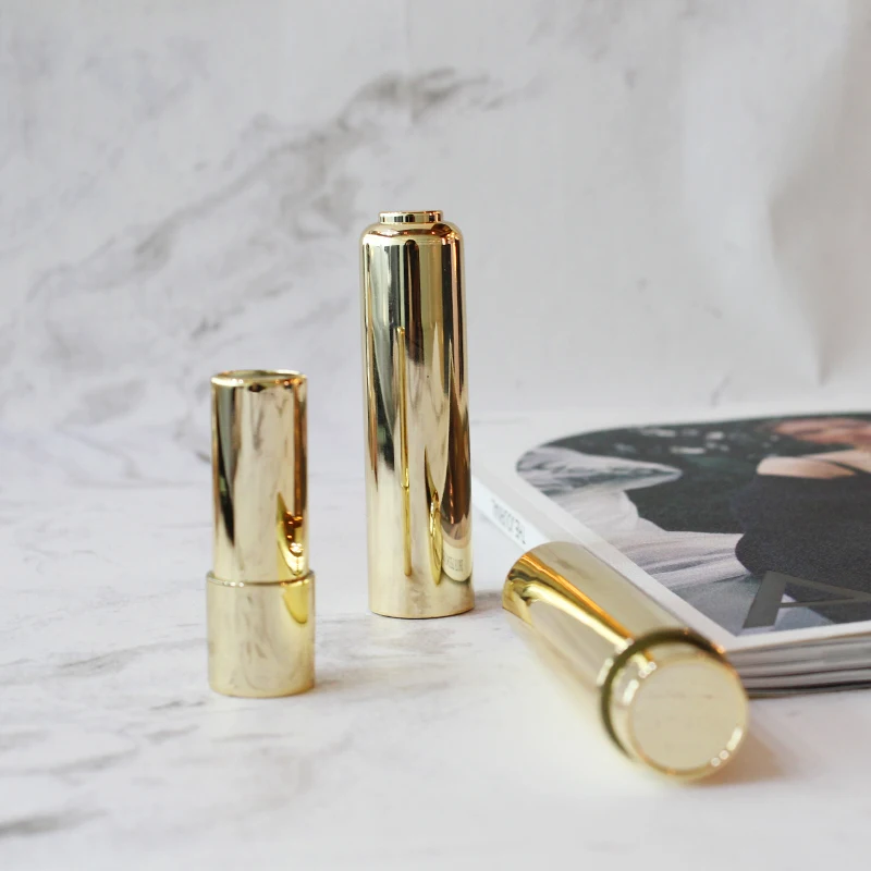 Wholesale luxury lipstick tube gold round shape lipstick container plastic lipstick packaging with customized logo