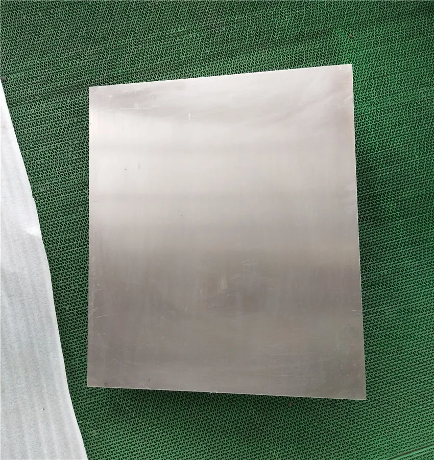 Commercially pure titanium plate with stock