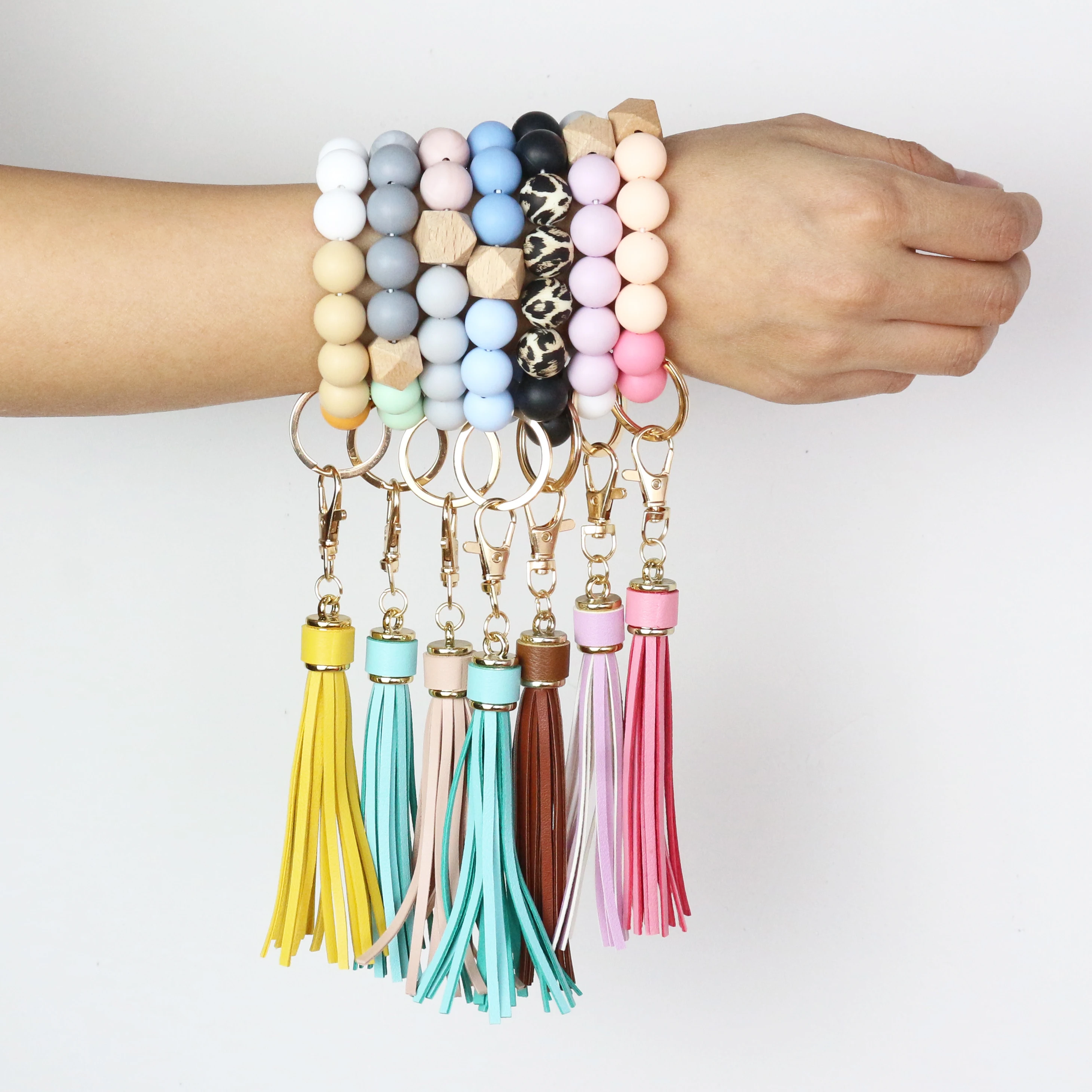 Лидер продаж 2021, изготовленный на заказ Силиконовый браслет с бусинами для прорезывания зубов, эластичный браслет, кожаный брелок с кисточкой, силиконовый браслет с бусинами