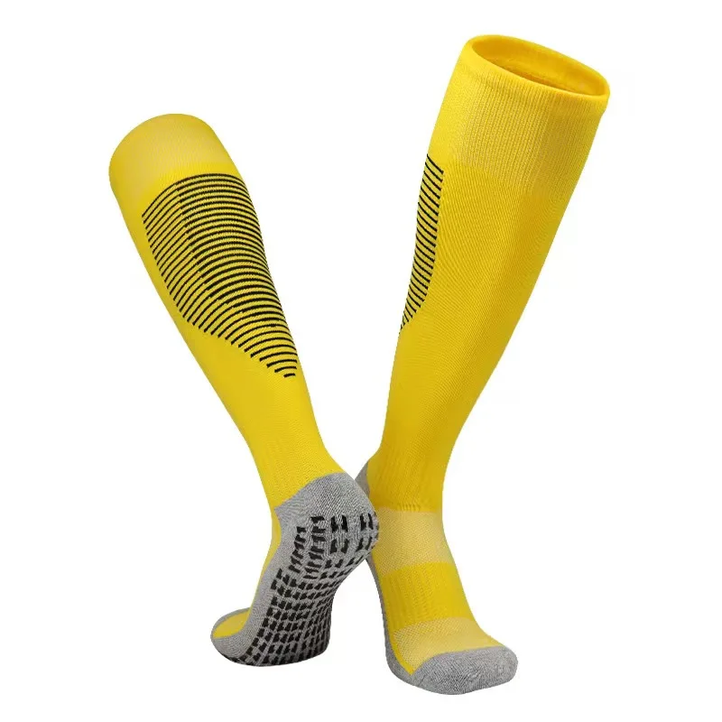 Football socks that absorb moisture and prevent slipping over the knee thick socks and adhesive socks