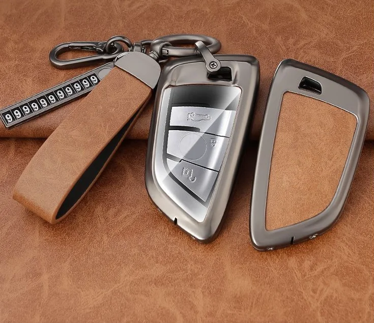 China manufacturer wholesale zinc alloy leather car key holder protector cover case with logo