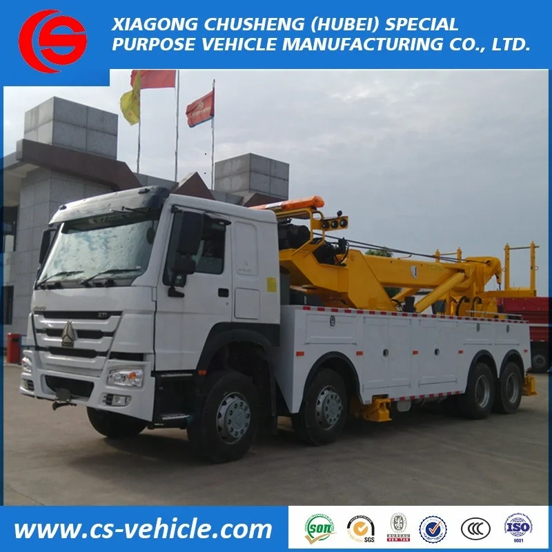 HOWO 360 degree rotation Crane 30tons Lifting 12 wheel heavy duty wrecker tow truck for sale