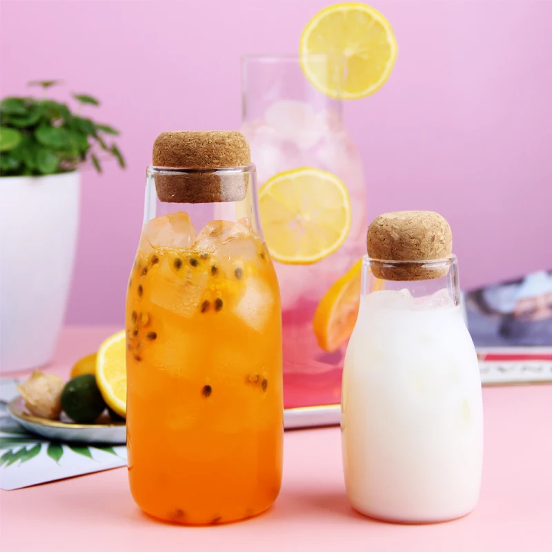 Kitchen Glass Storage jar with cork lid glass water bottle manufacture OEM  jars with unique feeder shape for honey