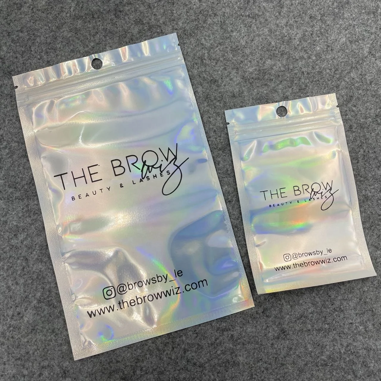 Wholesale Translucent Zip Lock Resealable Cosmetic Eyelashes Storage Bag Pouch Holographic Laser Packaging Bags