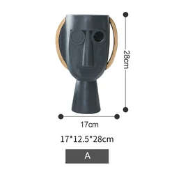 Wholesale 2021 home decor black resin face flower vase