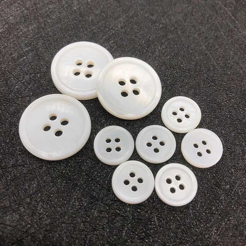 yiwu wintop 1000pcs per bag hot sale 4 hole round white small natural mother of pearl shell buttons for dress skirt