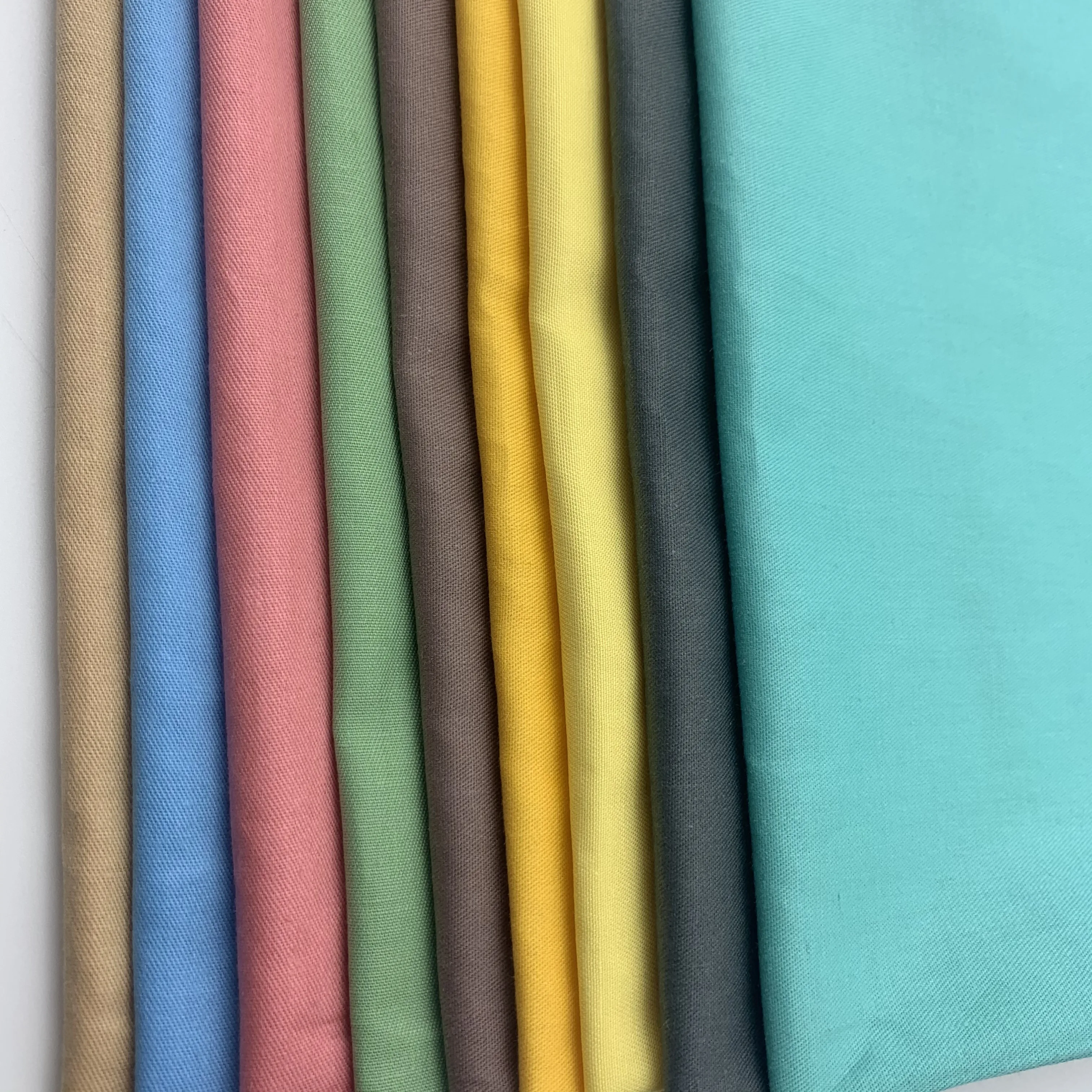 Hot sale quality 100% dyed cotton plain fabric online for bedsheet  cotton solid colour  cardigan and women dress