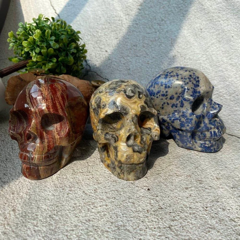 High quality hand carved natural crystal skull art sculpture folk crafts rainbow jasper skull for decoration
