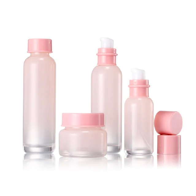 Excellent quality glass cosmetic bottles set, with rose glass decorations, cosmetic bottles and jars, accept orders of cream cosmetics glass bottles and jars