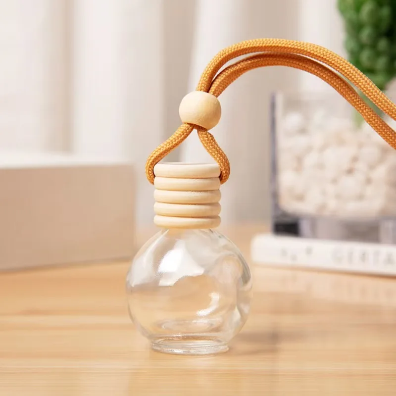 Custom Logo 16ml Spherical Clear Car Hanging Diffuser Aroma Oil Glass Perfume Bottle With Wooden Cap