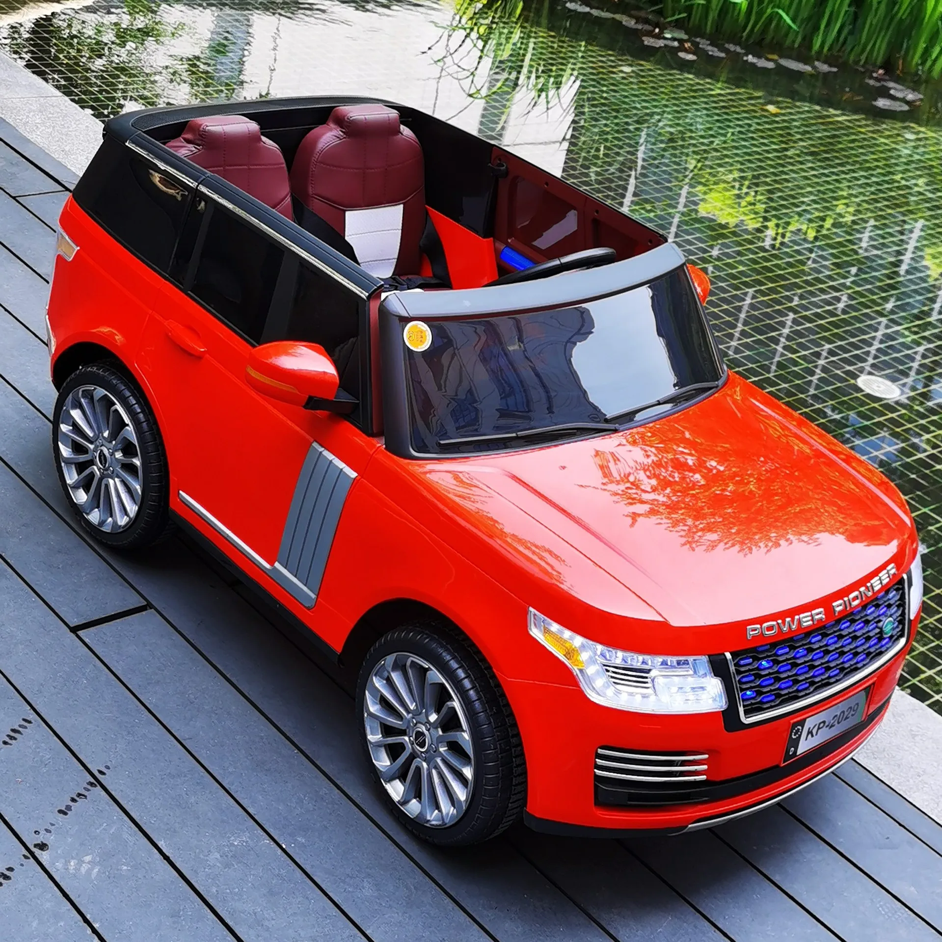 Manufacturers New electric vehicle four-wheel drift car drive remote control off-road baby toy car Battery Stroller