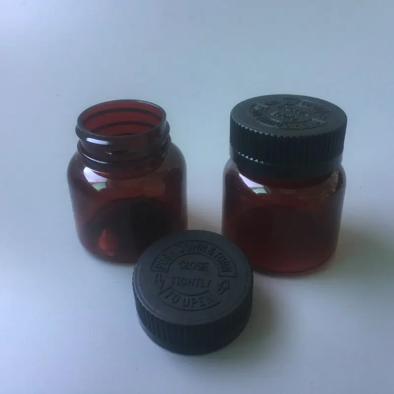 50cc amber child resistant capsule bottle PET Plastic Medicine Tablets Bottle Packaging Container with Press and Twist Cap lid