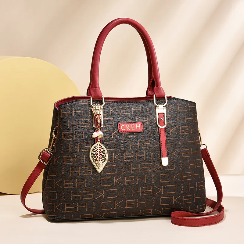 2024 Women luxury designer Pu leather Top-handle handbags Alphabetic printing large capacity vintage mom tote bag