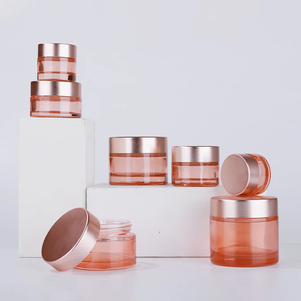 New product 5g 10g 15g 30g 50g 100g  clear pink glass cream jar with gold black sliver aluminium Cap Luxury skincare packaging