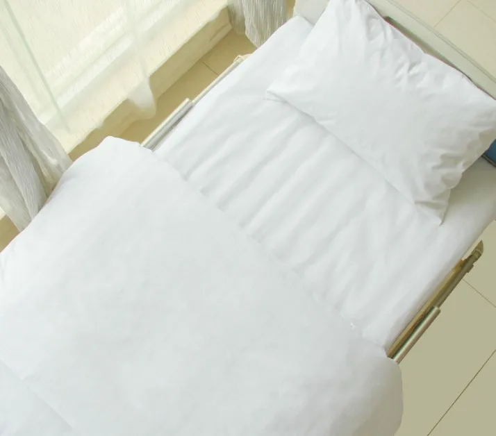 Factory cheap price White solid color durable hospital cotton bedsheet fabric 32S*32S