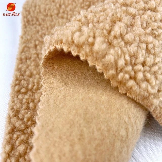 High quality 100% polyester polar fleeced fluffy fabric Knitted sleepwear poly super soft fleece bonded fabric for coat