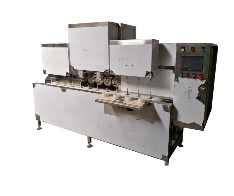 
apple/orange pitting and slice machine 
