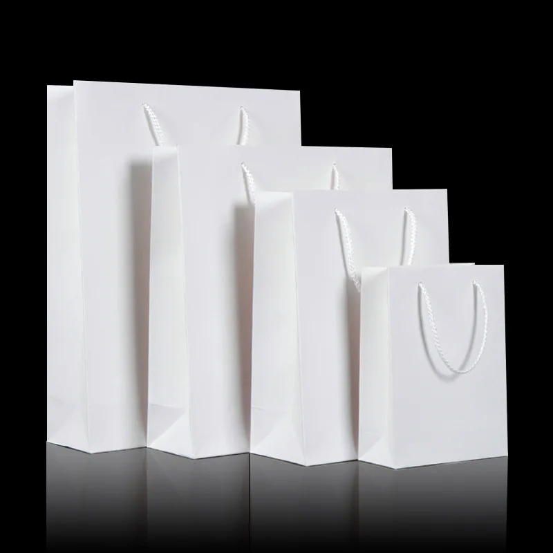 Custom Logo Luxury Kraft Paper Shopping Gift Bag Manufacturers White Black Paper Bags For Clothes