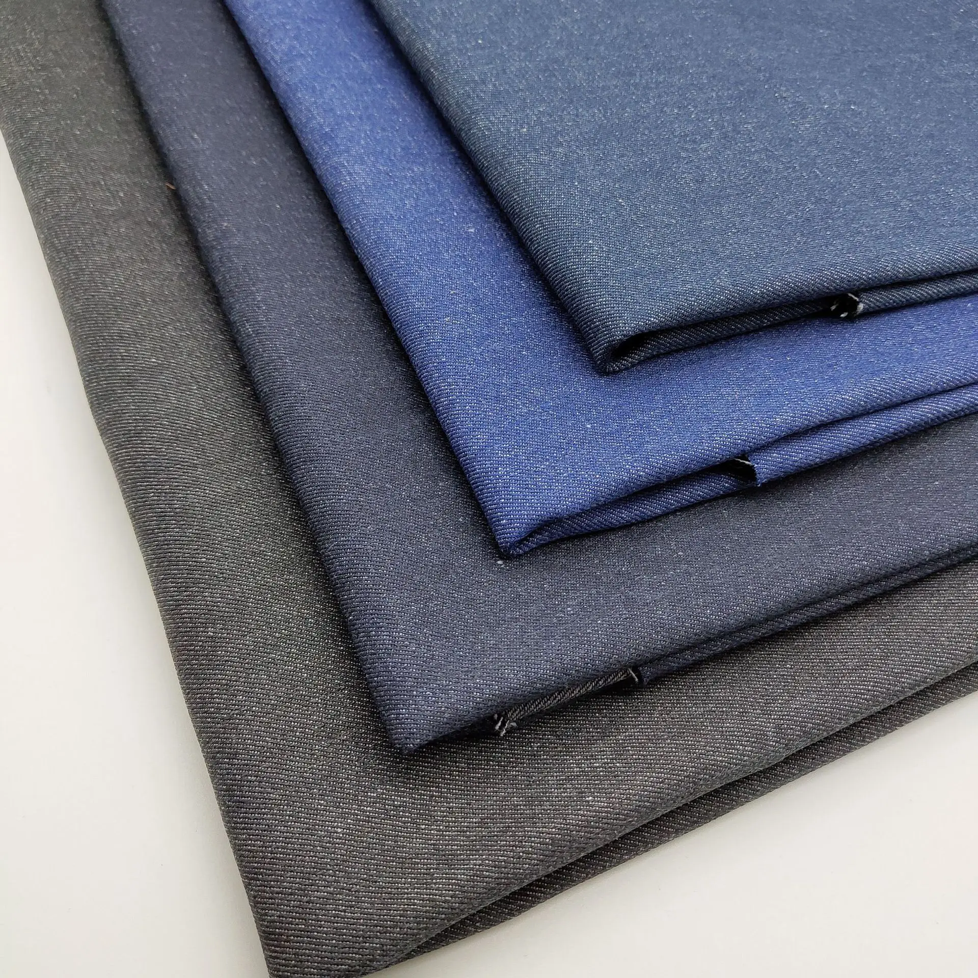 Designer Jean stock lot fabric Wholesale stretch Bleached jeans fabric italian resistant high stretch denim fabric high quality