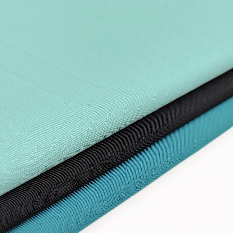 New Fashion Knitted Stretch Fabric 86 Nylon 14 Spandex Material Jacquard Fabric For Clothing