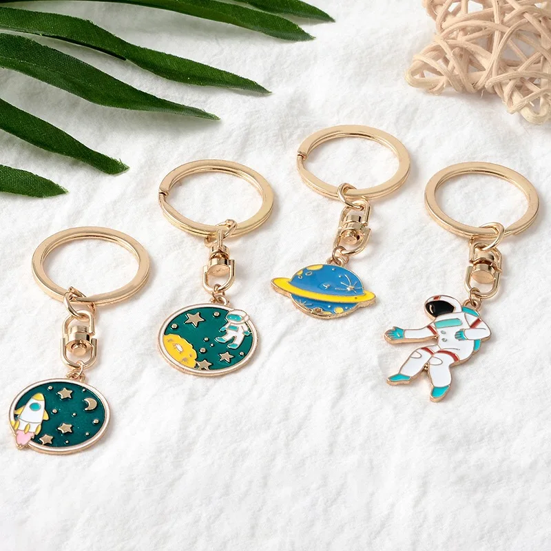 4 Styles Escape from the earth ! UFO Space Craft Astronaut Rocket Planet Spaceman Universe Star Key Ring KeyChain For astrophile