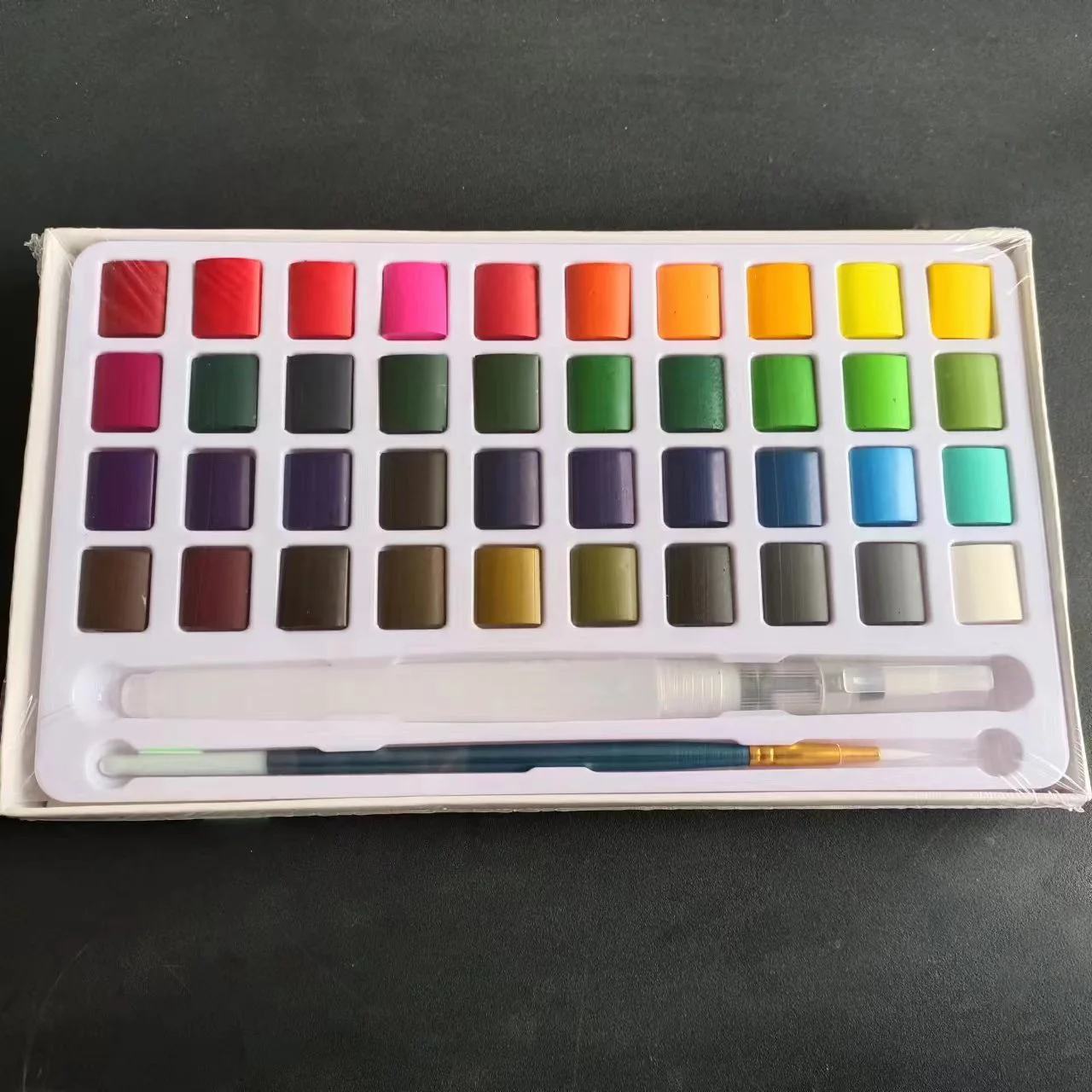 Bright and rich color 40color solid watercolor paint set with two brush pen