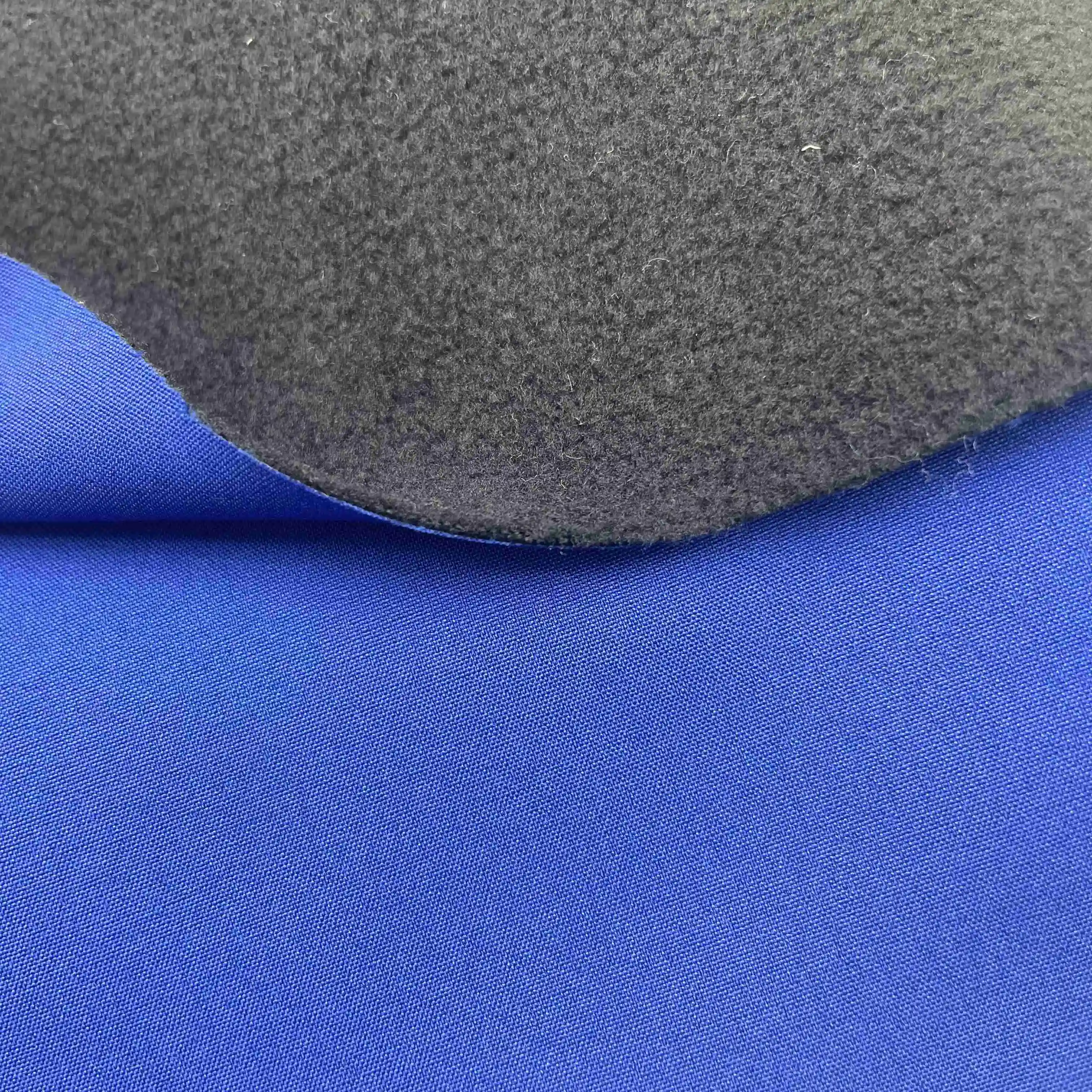 soft shell tricot fabric polar fleece bonded fabric three in one laminated coral fleece bonded sponge fabric OEM can customize