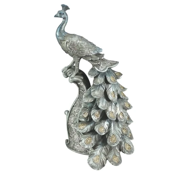 Resin peacocks stand on a cylindrical tabletop to decorate the statue