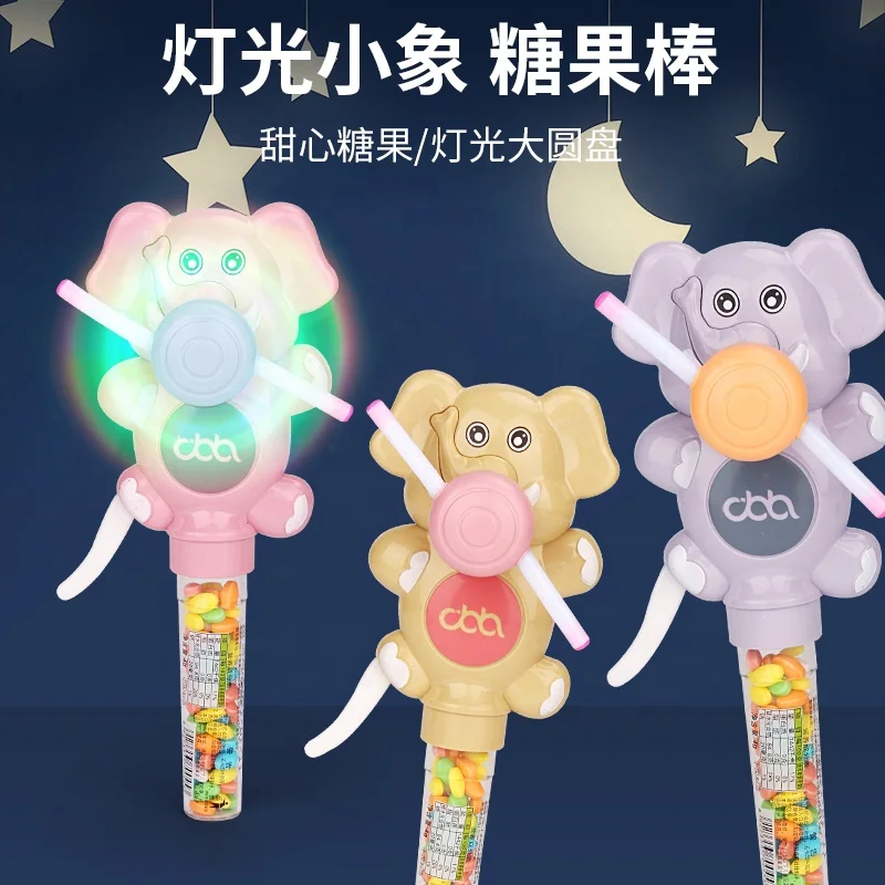Good quality ABS plastic animal toy candy surprise gift for kids luminous Light up elephant hand fan candy toy