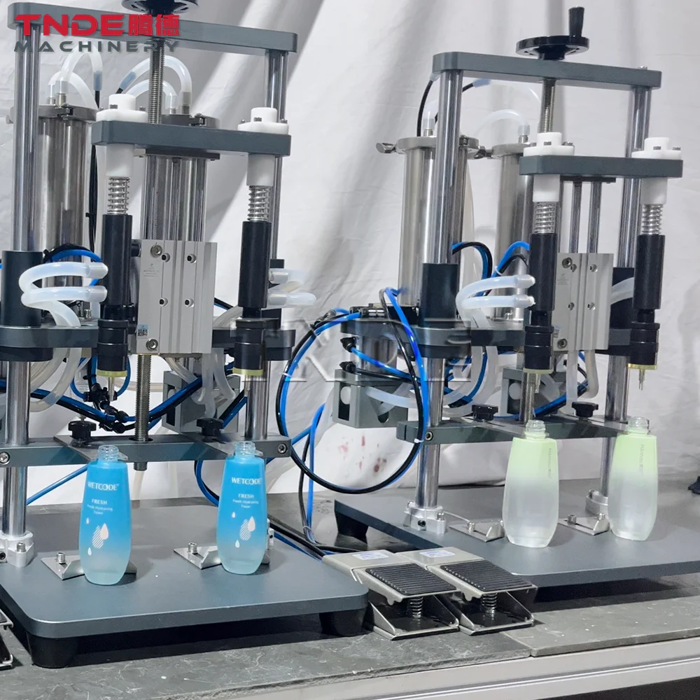 Guangzhou TNDE 2 Head Vacuum Filling Machines Pneumatic Desktop Filler for Small Business air cushion machine