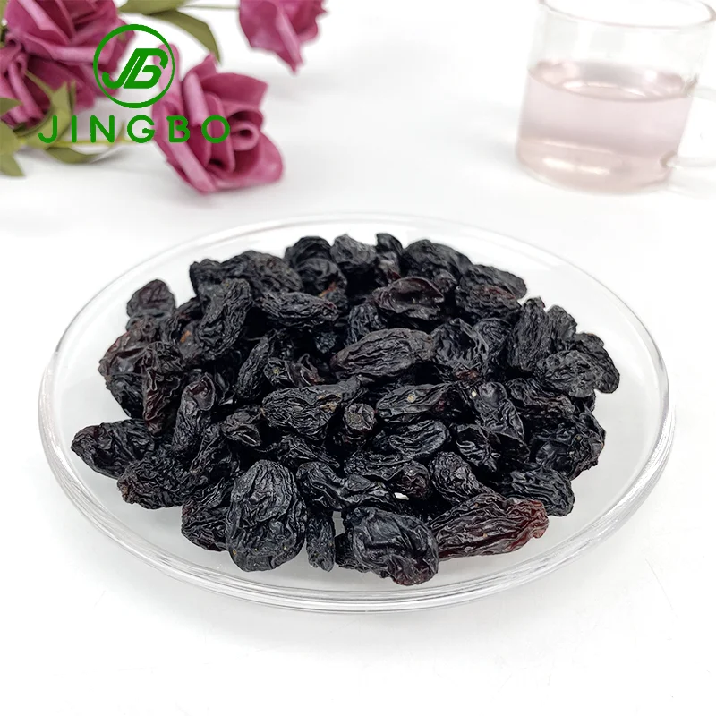 Оптовая продажа высококачественный сушеный виноград с богатым вкусом насыщенное сладкое питание органический черный изюм.
