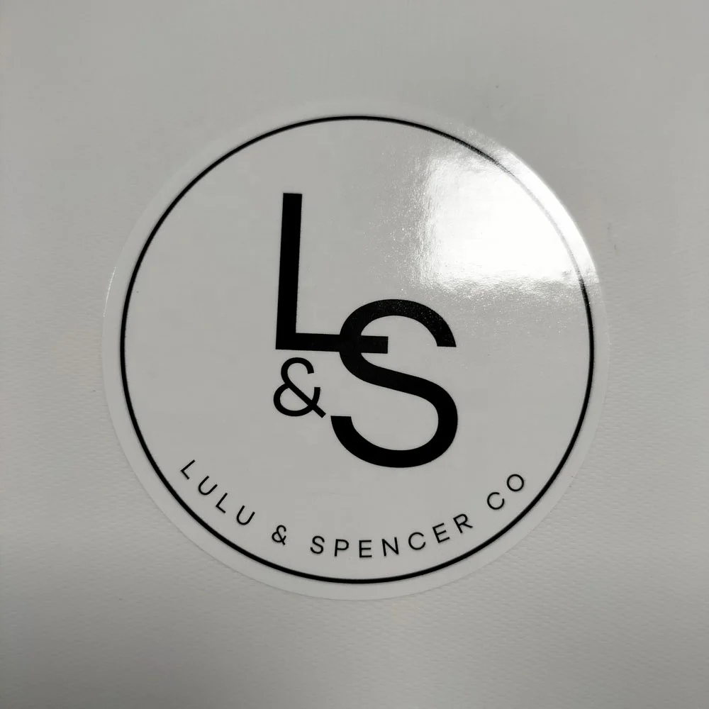 Wholesaler fashion design waterproof paper stickers garment label transparent stickers roll with your own logo