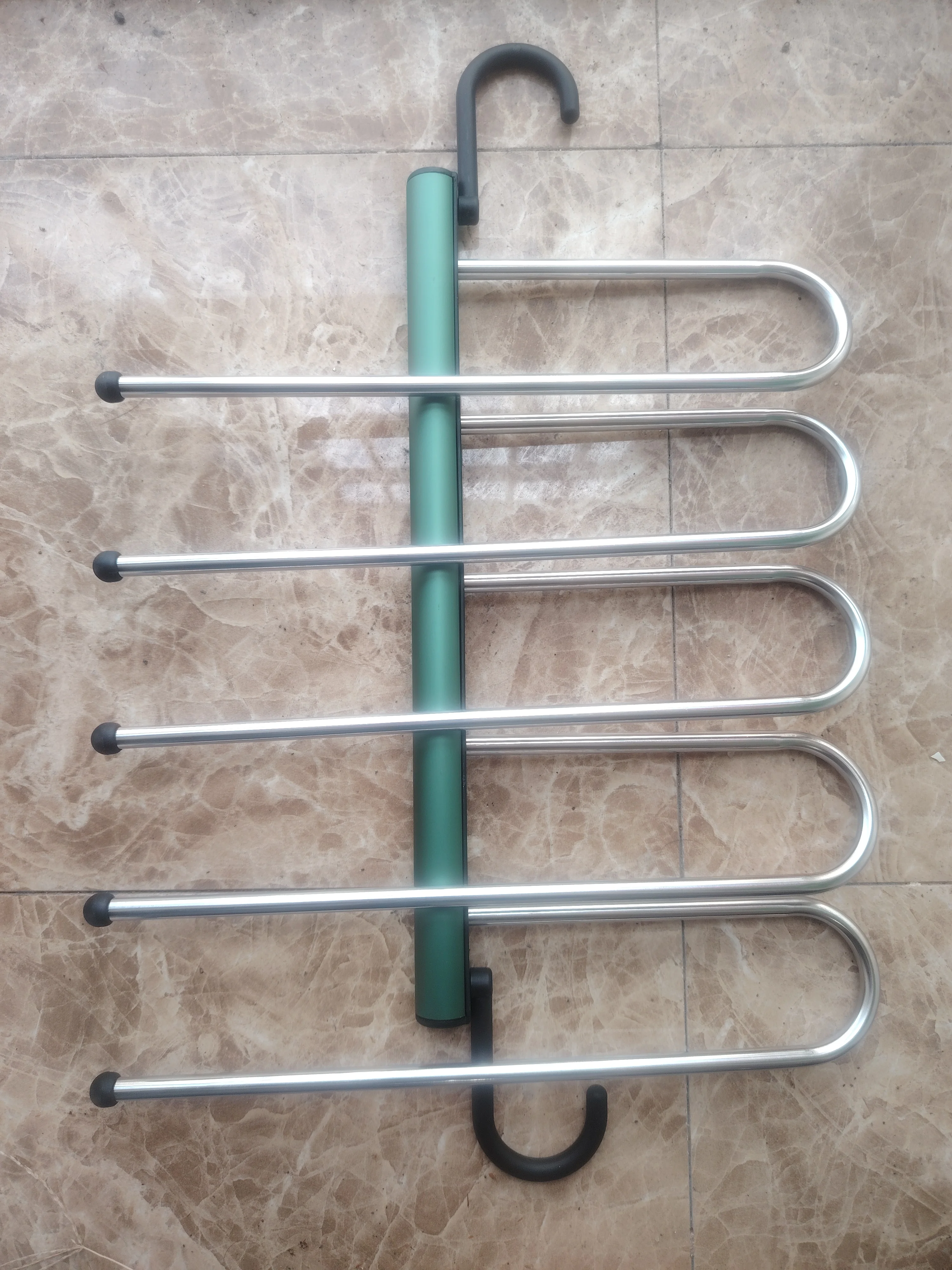 Hot selling space saving seamless telescopic folding multifunctional trouser rack home magic wardrobe storage rack meta