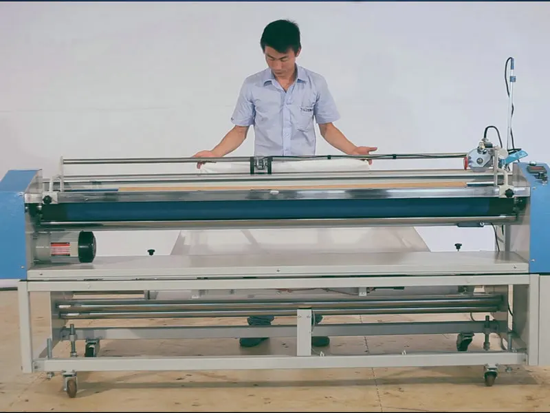 New Type nonwoven fabric rolling and cutting machine/automatic industrial fabric cutting machine best selling products in europe