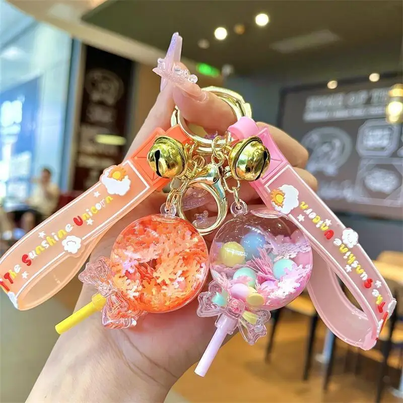 Luminous oil floating acrylic key chain pendant wholesale creative liquid quicksand Snowflake Lollipop Keychain