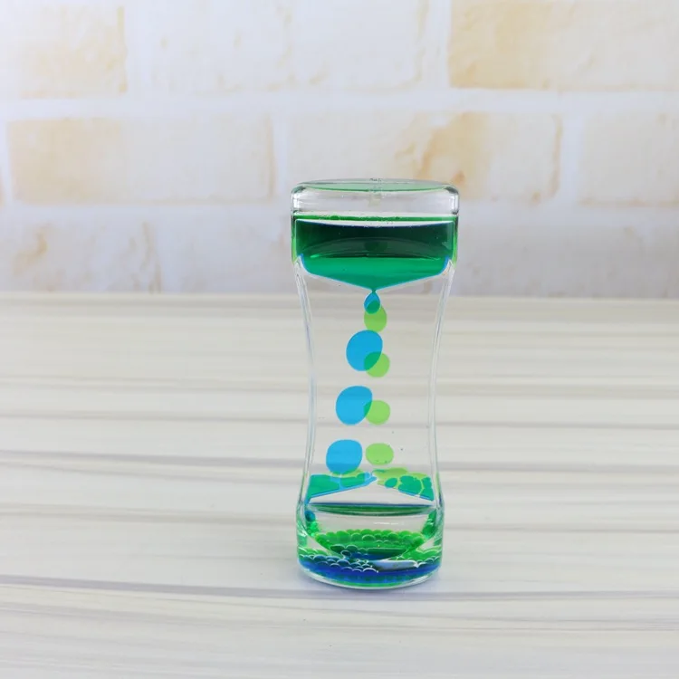 Wholesale Desk Liquid Motion Spiral Toy Acrylic Liquid Timer With Glass Hourglass Floater