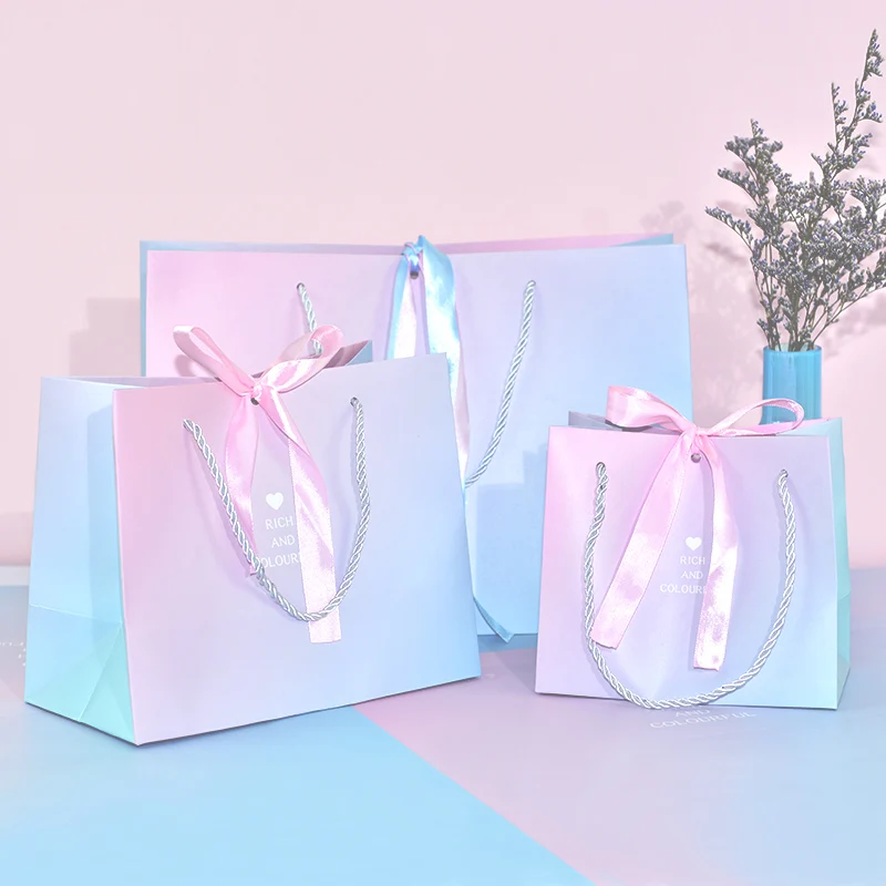 Wholesale sac papier luxe party gift bags paper custom printed on glossy paper bag