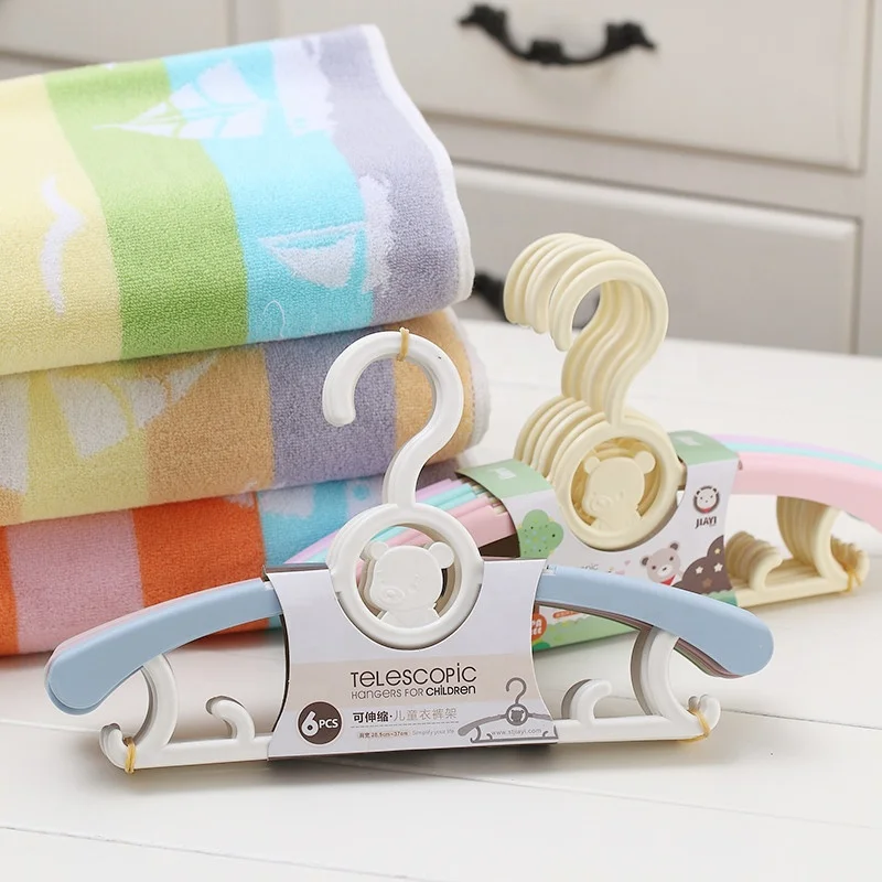 Wholesale Factory Groove Design Scalable Heavy-Duty Plastic Baby Clothing Hangers for Baby Children Kids