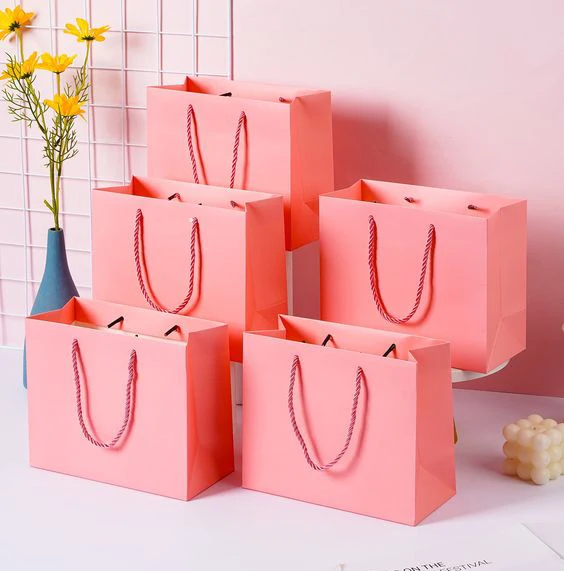 Custom Luxury Clothing Retail Packing Bag White Gift Bag bolsas de papel Shopping Packaging Paper Bags With Handles For Clothes