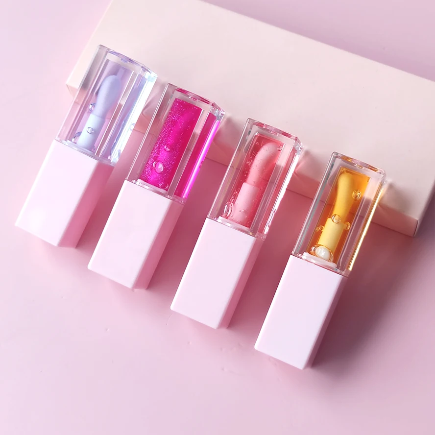 Vegan Strawberry Watermelon Fruit Plumping Lip Oil Private Label Custom Logo Lip Gloss Flavoring Oil Color Changing Lip Oil