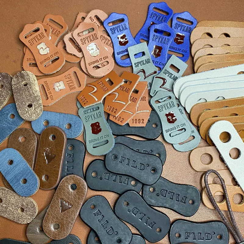 Custom logo PU Leather Zipper Pulls Zipper Tags Fixer Wholesale Garment Accessories Durable Boot Zipper Heads for Bags Jacket